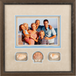 family on beach with seashells